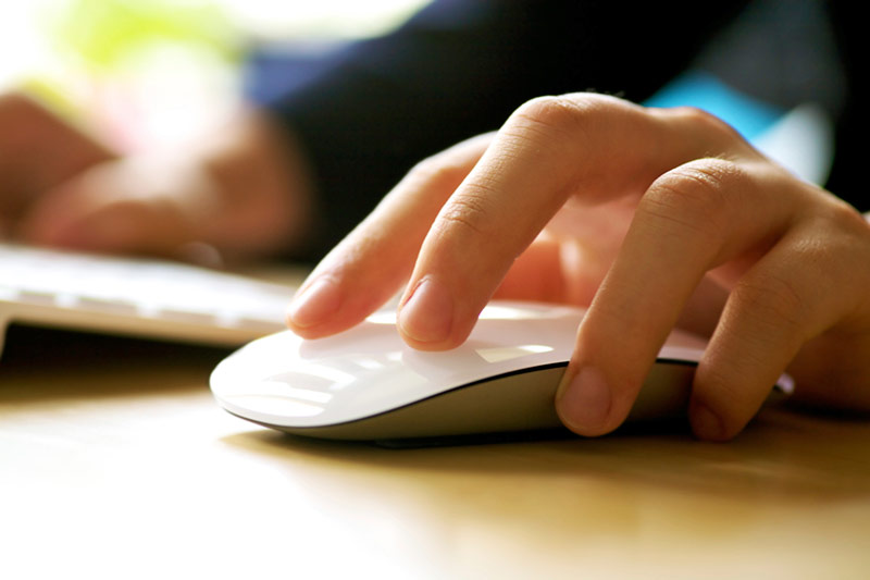 Hand On Computer Mouse